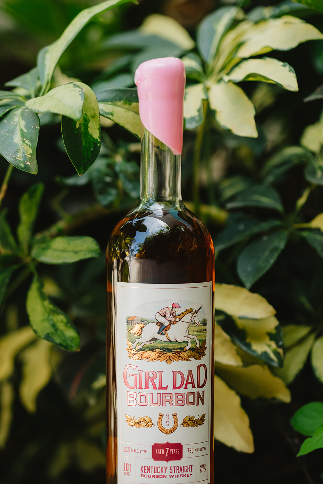 Girl Dad Bourbon bottle with signature pink wax seal